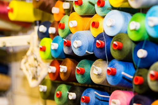 Colorful cones and spools of thread at an atelier. Colorful cones and spools of thread at an atelier.